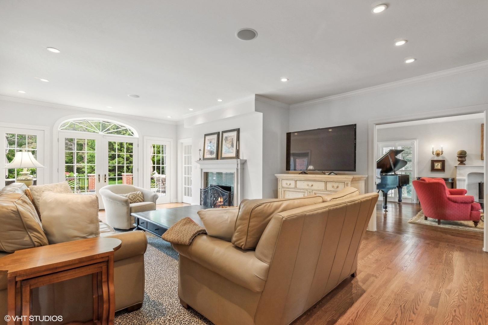 650 East Deerpath Road Lake Forest, IL 60045 - Photo 10 of 45 a living room with furniture fireplace and a flat screen tv
