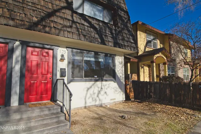 a view of entrance gate of a house