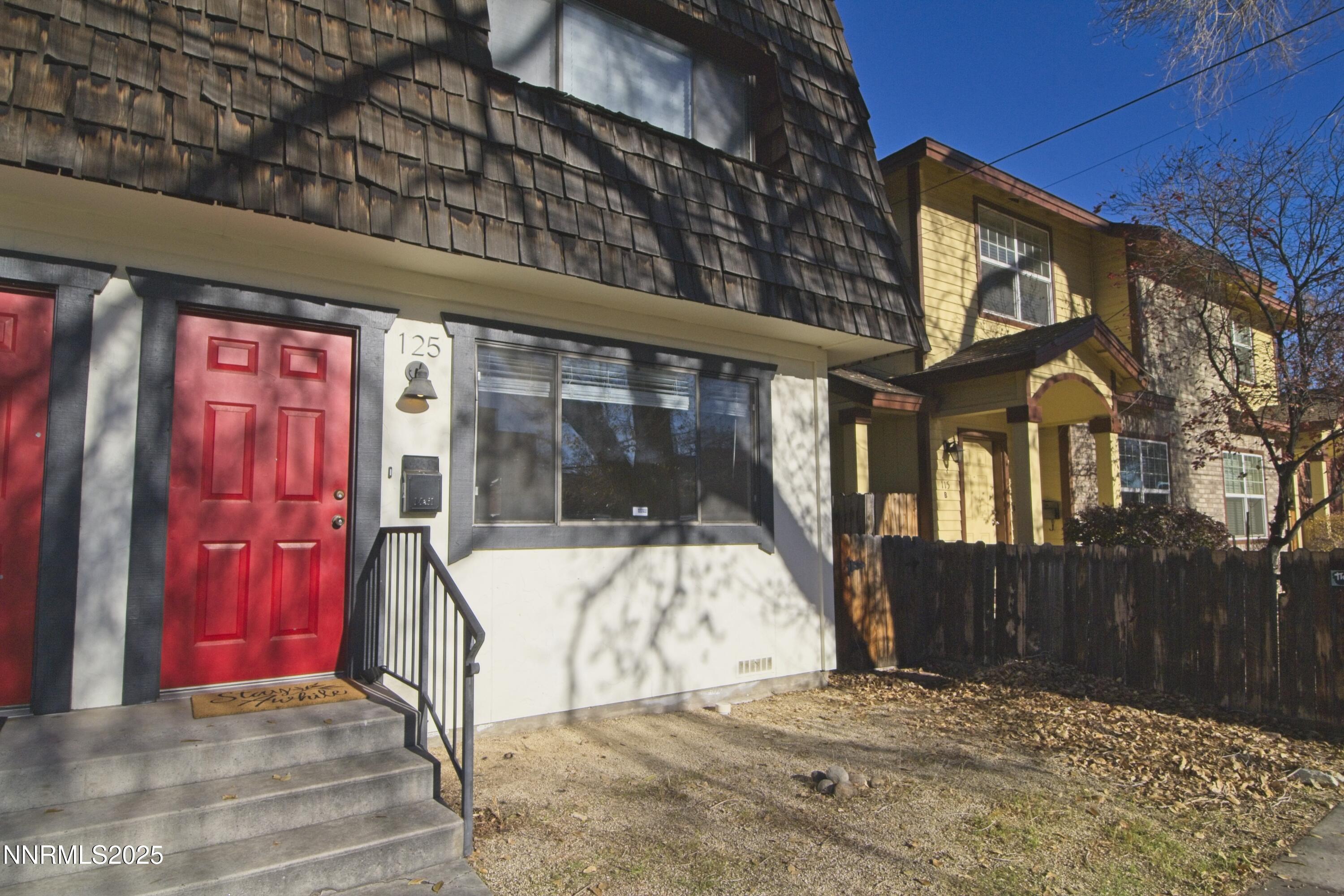 a view of entrance gate of a house