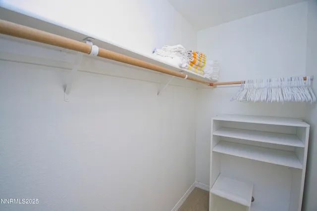 a view of small space with racks on the wall