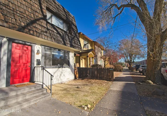 a view of a building with a yard