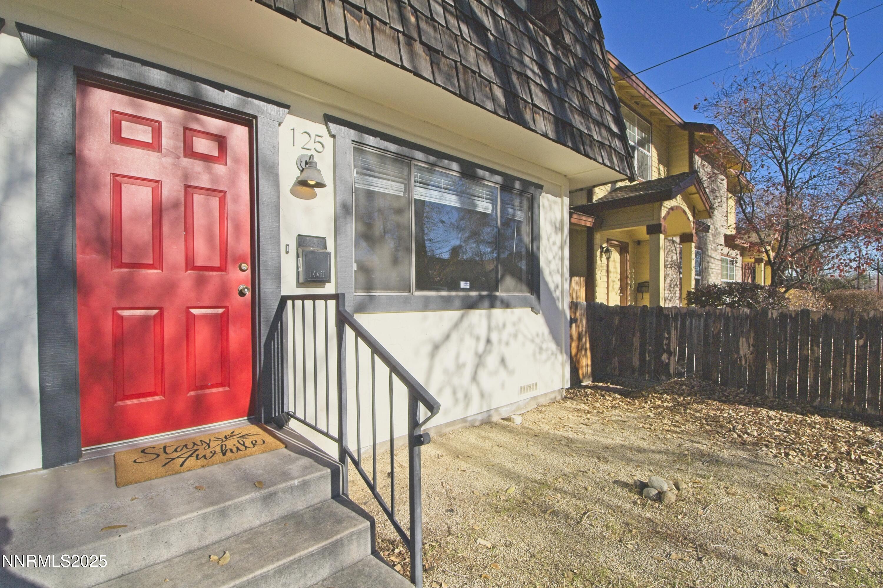 125 Mary Street, Unit A Reno, NV 89509 - Photo 22 of 22 a view of a brick house with a small yard