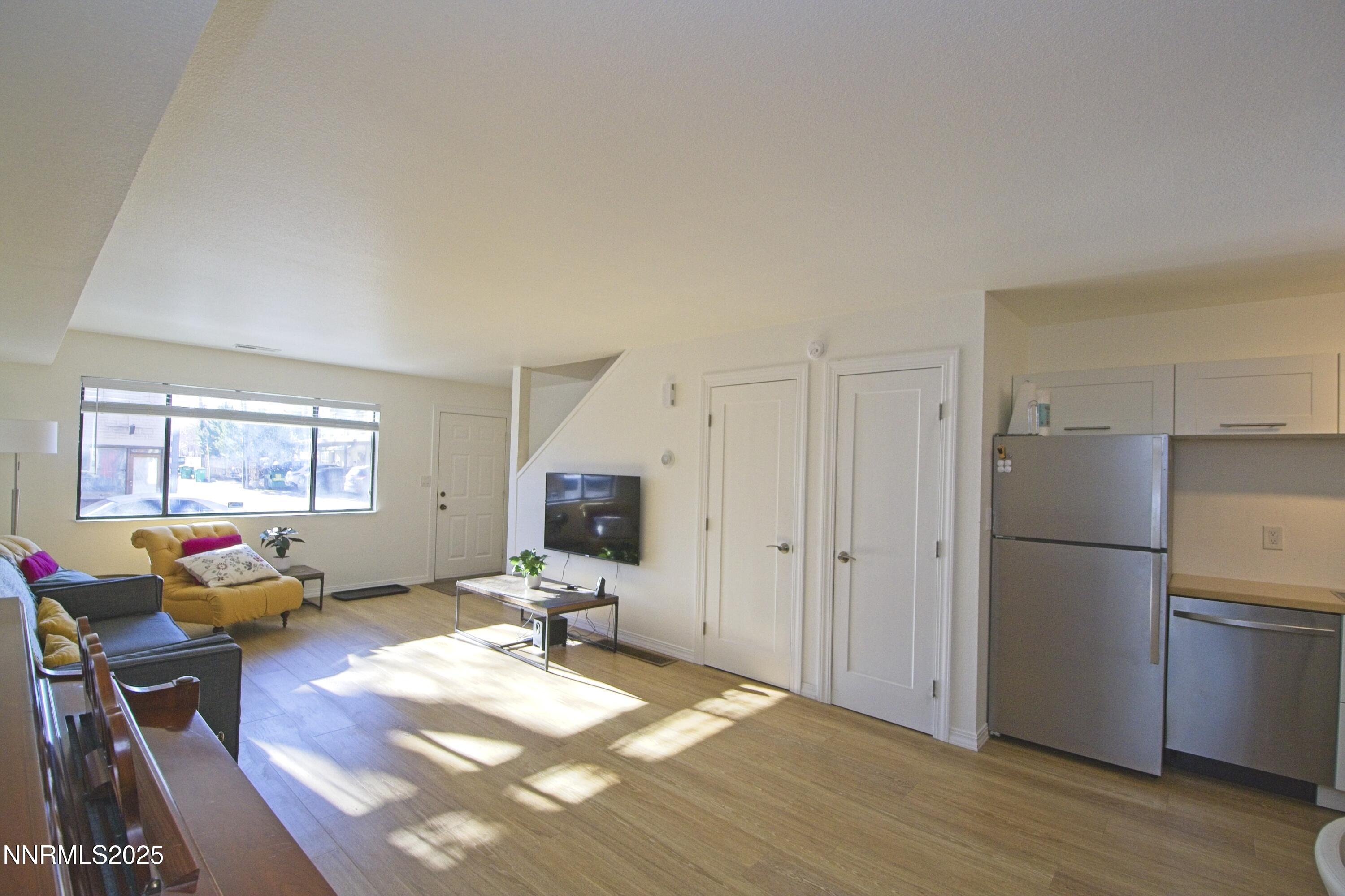 125 Mary Street, Unit A Reno, NV 89509 - Photo 5 of 22 a room with a bed furniture and a window