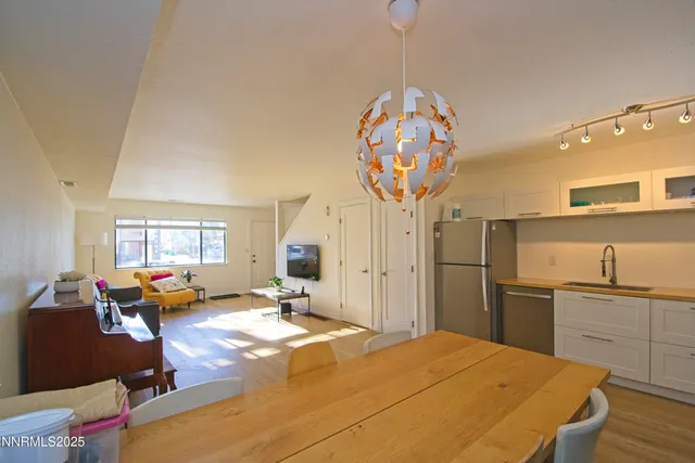 a very nice looking bedroom with a large window