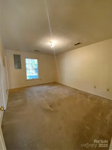 a bathroom with a double vanity sink and a toilet
