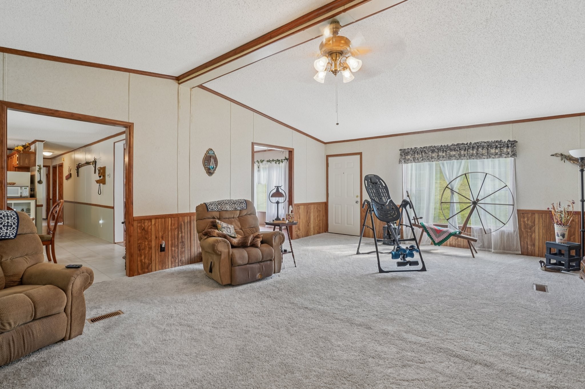 1765 Williamson Branch Road Vanleer, TN 37181 - Photo 14 of 59 a view of a livingroom with furniture and a couch