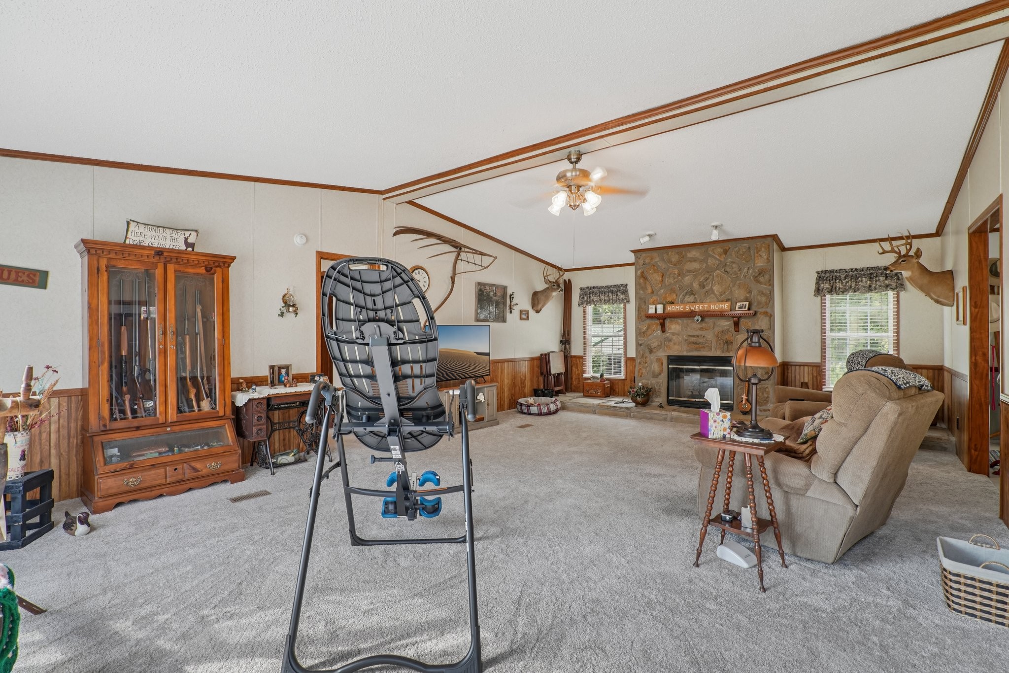 1765 Williamson Branch Road Vanleer, TN 37181 - Photo 16 of 59 a living room with furniture a couch and large window