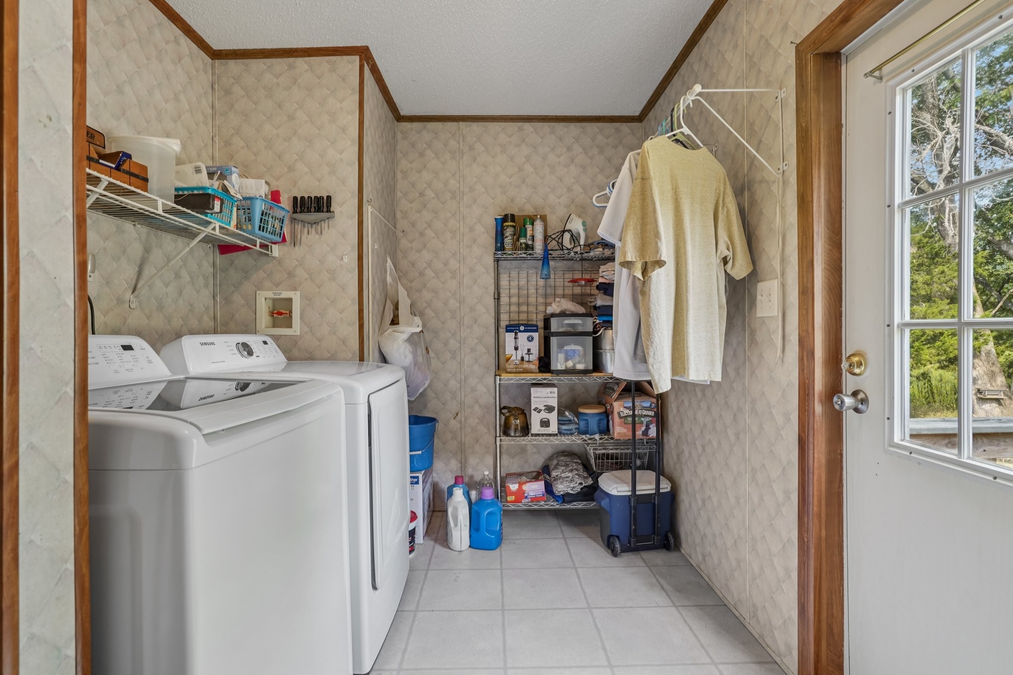 1765 Williamson Branch Road Vanleer, TN 37181 - Photo 30 of 59 a view of walk in closet with clothes and shoes