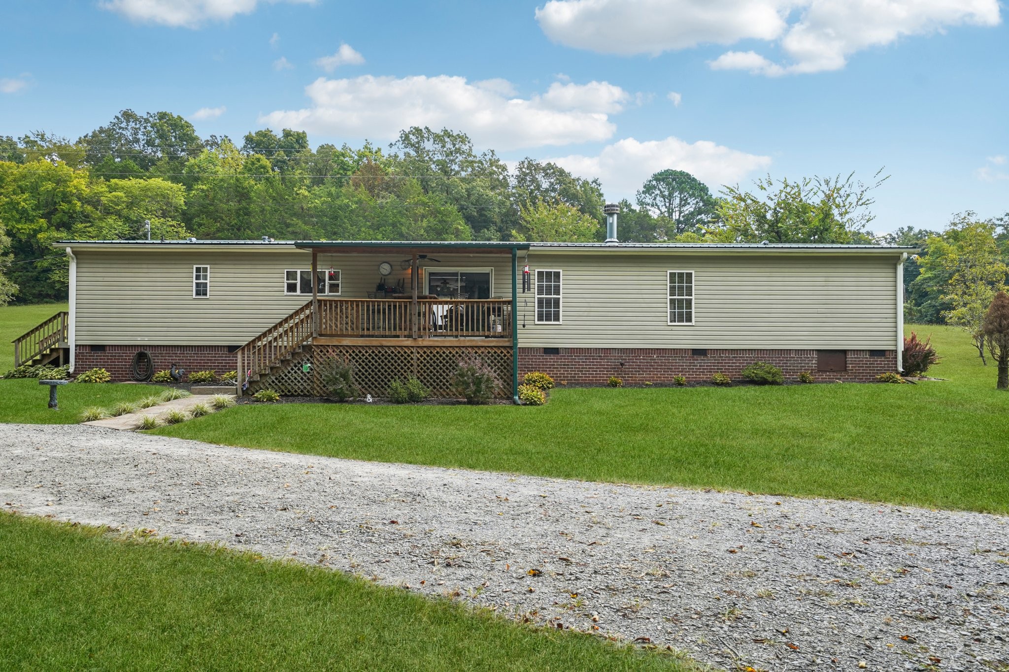 1765 Williamson Branch Road Vanleer, TN 37181 - Photo 32 of 59 a front view of house with yard and green space