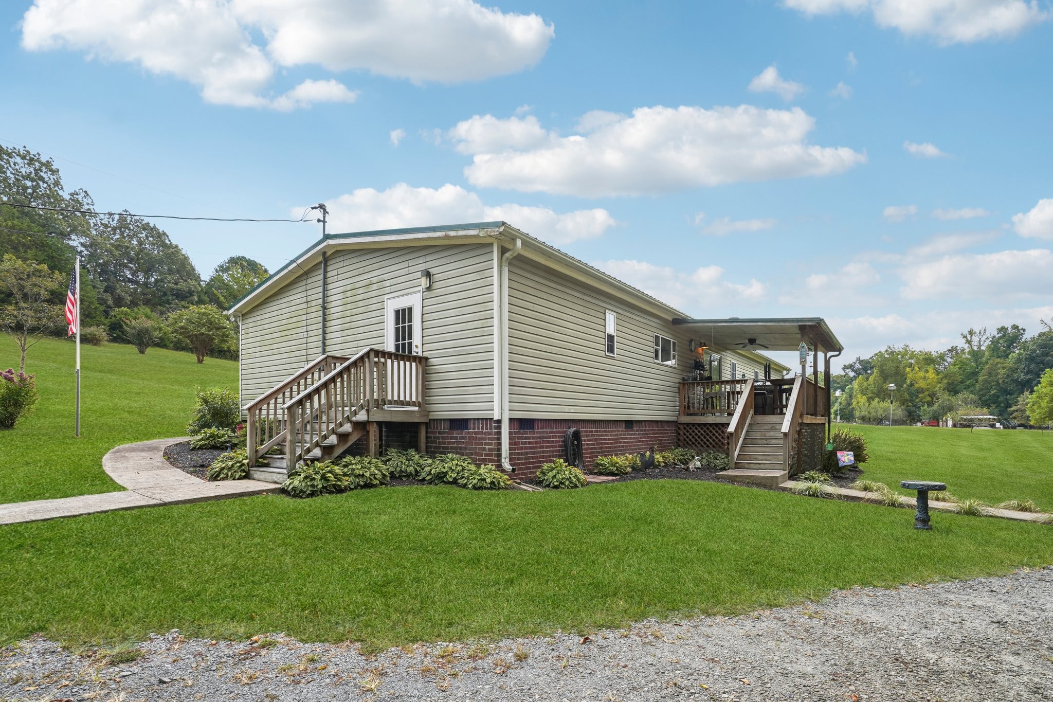 1765 Williamson Branch Road Vanleer, TN 37181 - Photo 33 of 59 a view of a house with a backyard