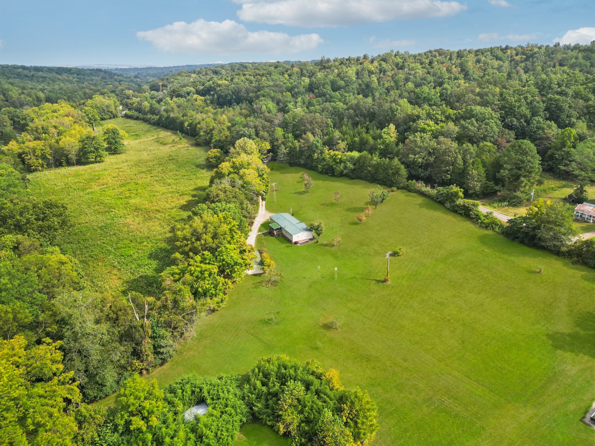 1765 Williamson Branch Road Vanleer, TN 37181 - Photo 41 of 59 a view of a lake with a yard