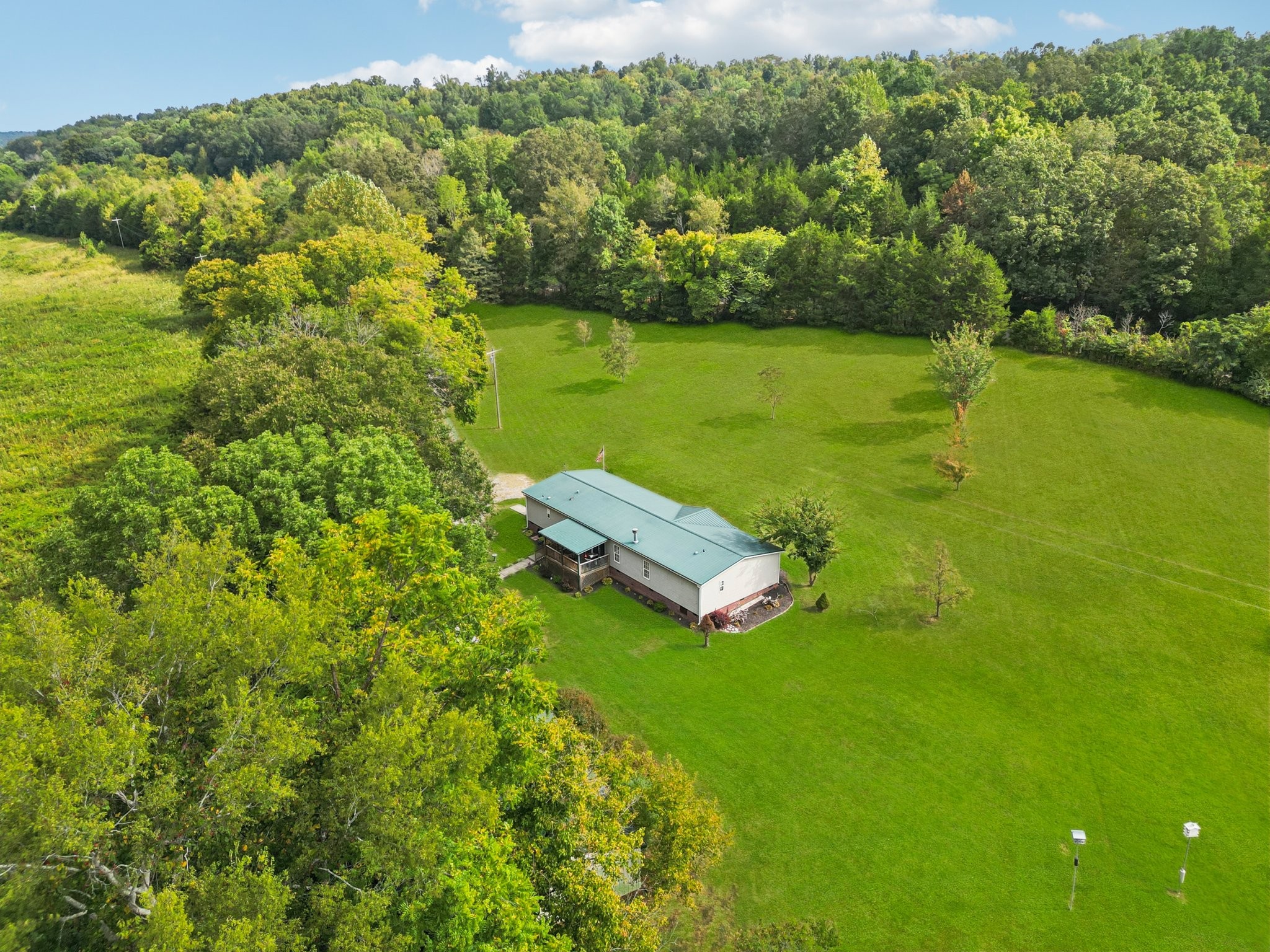1765 Williamson Branch Road Vanleer, TN 37181 - Photo 42 of 59 a view of a lake with a big yard