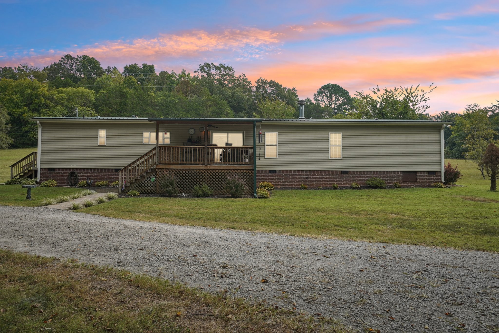 1765 Williamson Branch Road Vanleer, TN 37181 - Photo 53 of 59 a front view of a house with garden