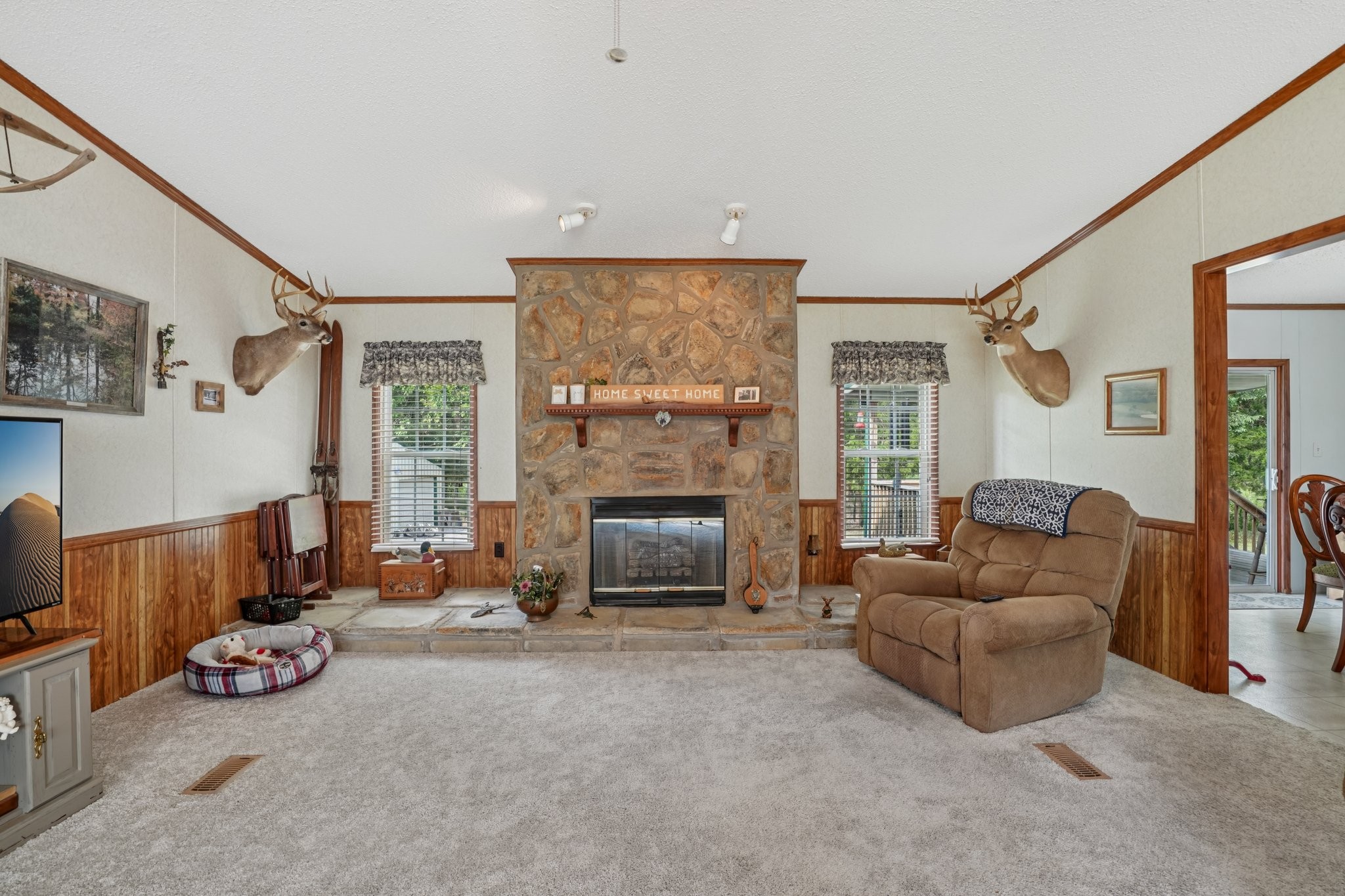 1765 Williamson Branch Road Vanleer, TN 37181 - Photo 6 of 59 a living room with furniture and a fireplace
