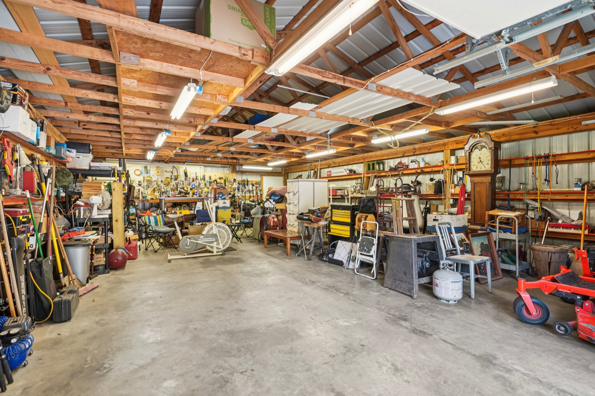 1765 Williamson Branch Road Vanleer, TN 37181 - Photo 10 of 59 a view of a storage room with a lot of stuff
