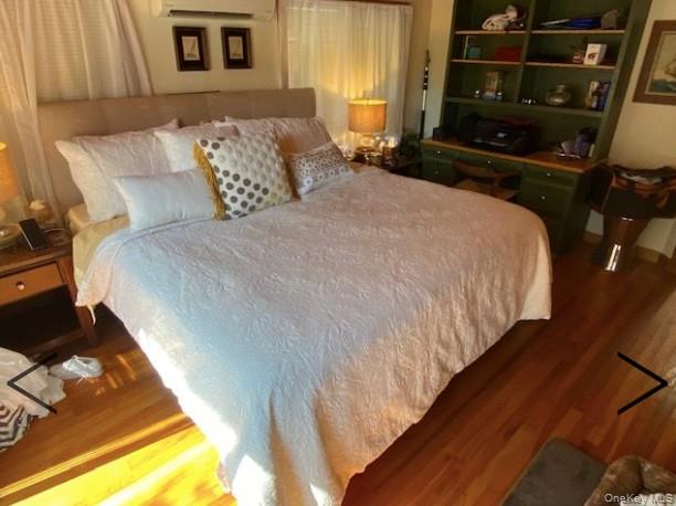 151 Ocean Road Ocean Beach, NY 11770 - Photo 13 of 19 a bedroom with bed and window