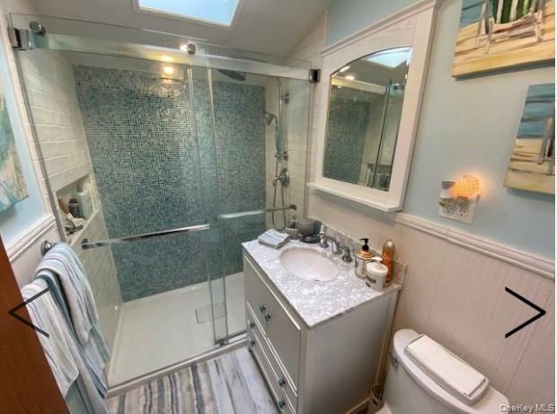 151 Ocean Road Ocean Beach, NY 11770 - Photo 17 of 19 a bathroom with a sink toilet and shower