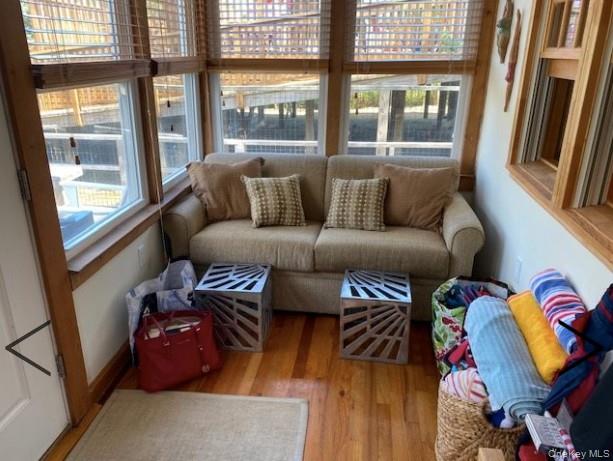 151 Ocean Road Ocean Beach, NY 11770 - Photo 3 of 19 a living room with furniture and a large window