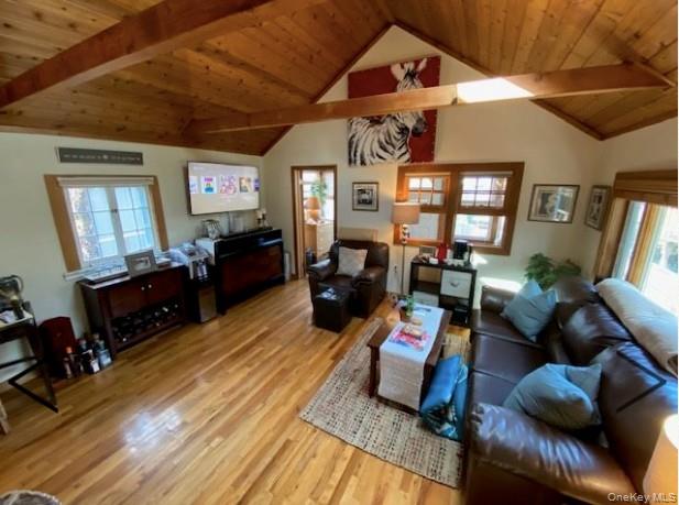 151 Ocean Road Ocean Beach, NY 11770 - Photo 5 of 19 a living room with furniture and wooden floor