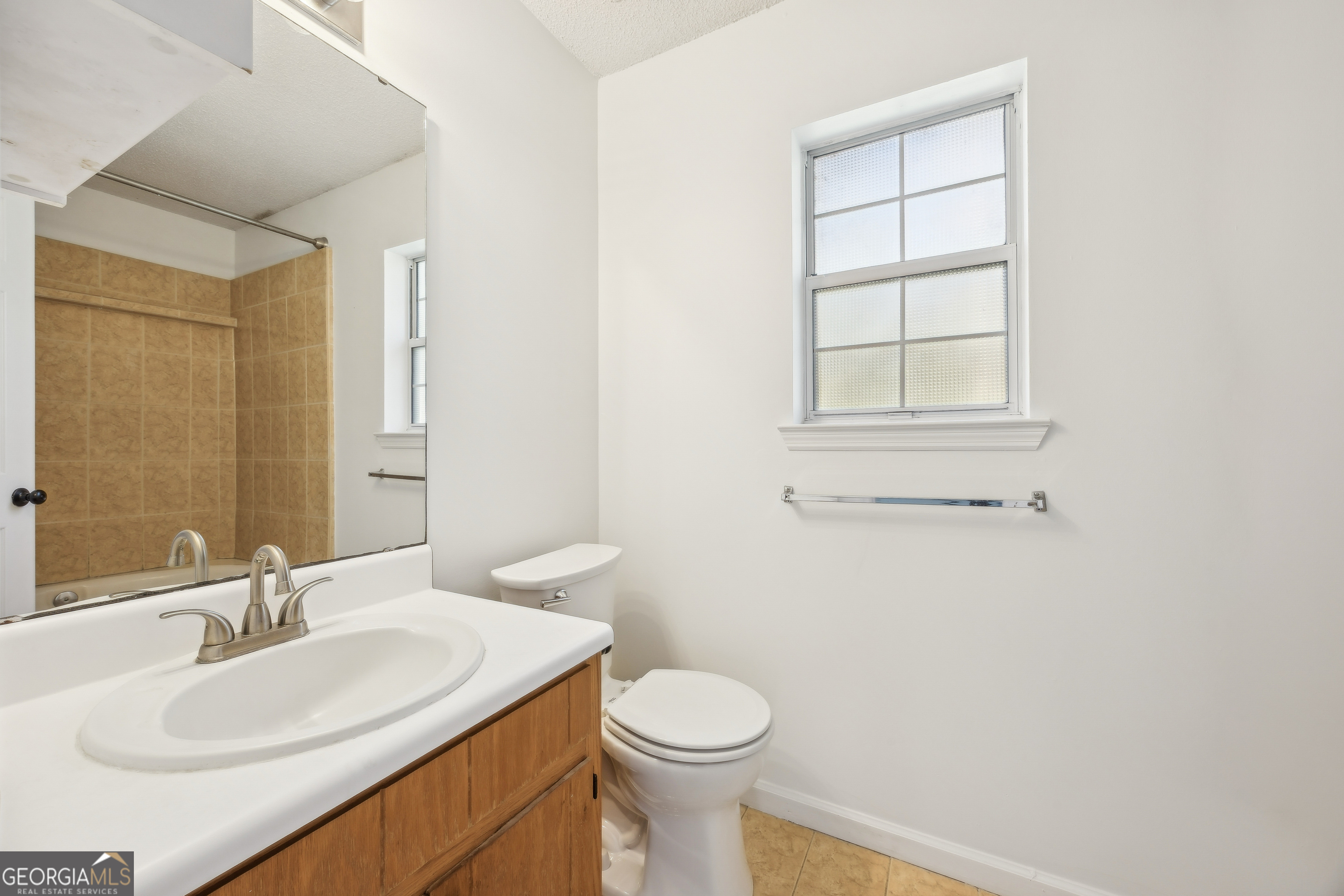 114 Colony Pines Drive Kingsland, GA 31548 - Photo 27 of 47 a bathroom with a sink toilet and vanity