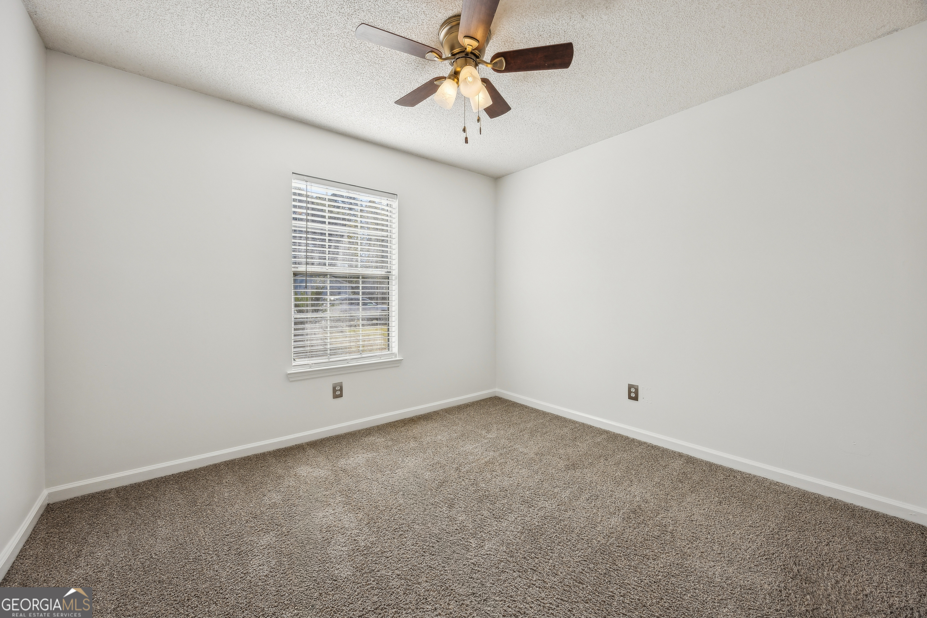 114 Colony Pines Drive Kingsland, GA 31548 - Photo 34 of 47 a view of an empty room with a window