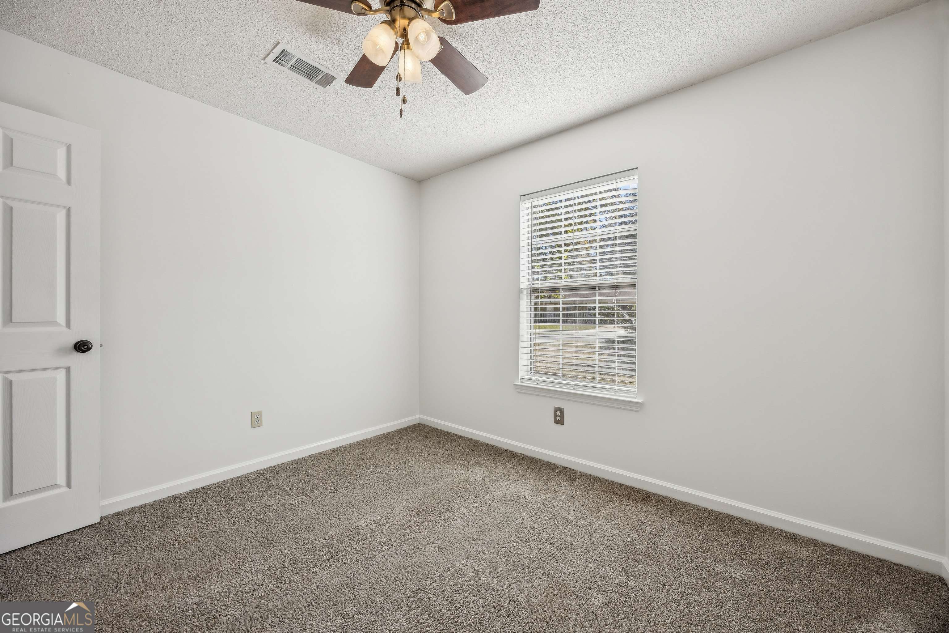 114 Colony Pines Drive Kingsland, GA 31548 - Photo 36 of 47 a view of an empty room with a window