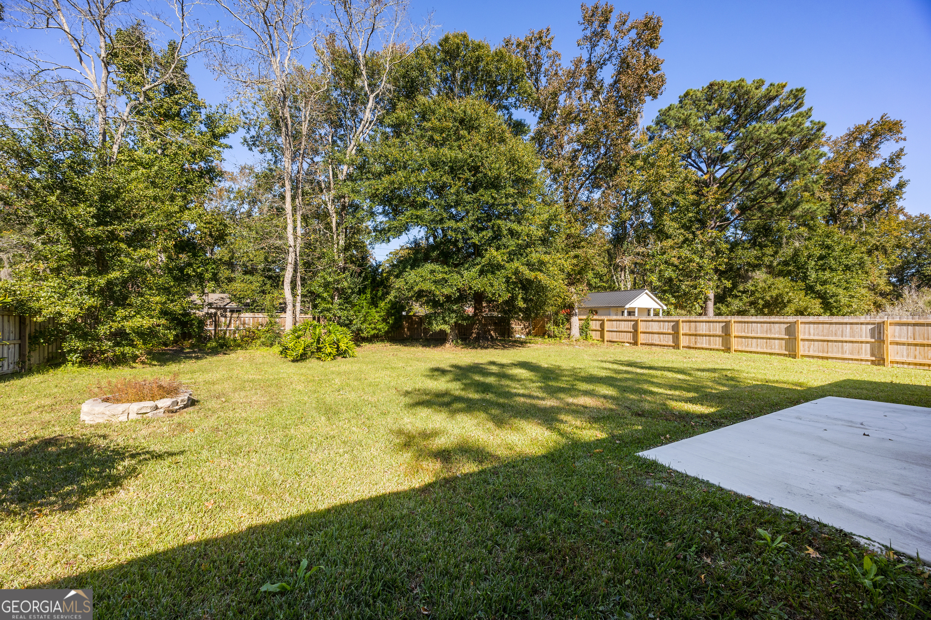 114 Colony Pines Drive Kingsland, GA 31548 - Photo 45 of 47 a view of a swimming pool with an outdoor space
