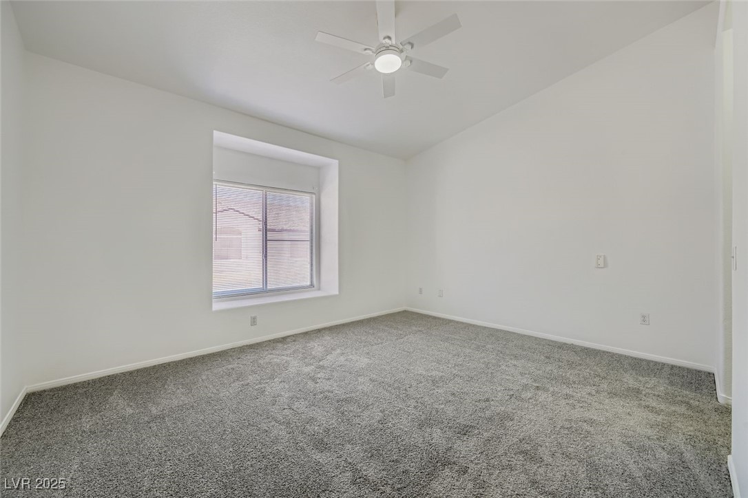4941 Black Bear Road, Unit 203 Las Vegas, NV 89149 - Photo 10 of 11 2nd bedroom with carpet flooring, different view