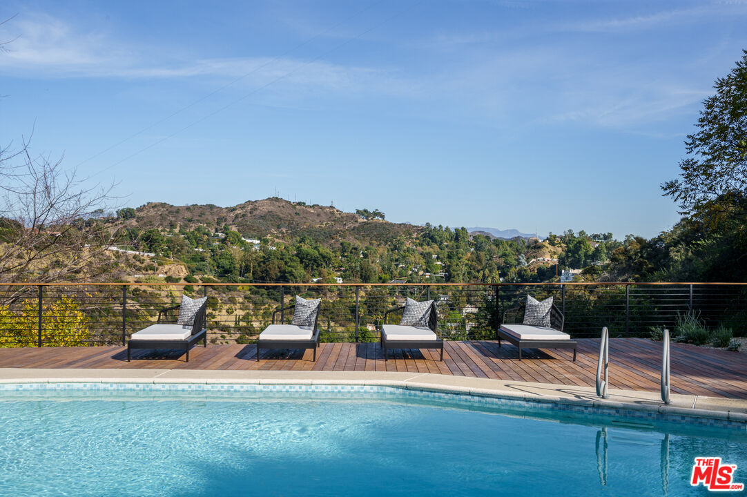 2658 Carmar Drive Los Angeles, CA 90046 - Photo 24 of 29 a view of a chairs and table on the terrace