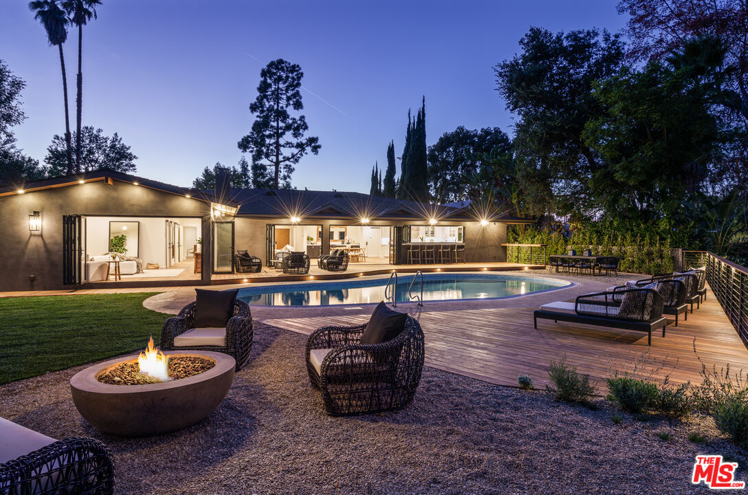 2658 Carmar Drive Los Angeles, CA 90046 - Photo 27 of 29 a living room with furniture and a large window