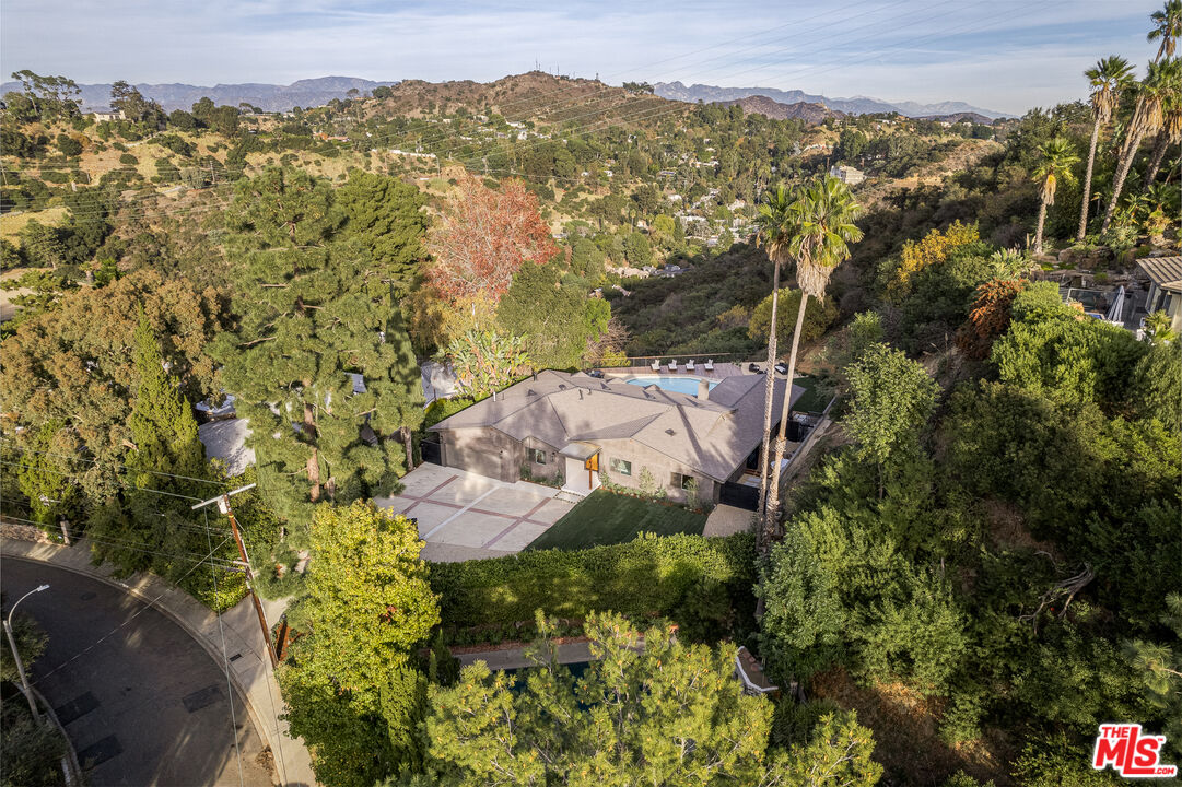 2658 Carmar Drive Los Angeles, CA 90046 - Photo 29 of 29 an aerial view of a house with a yard and mountain view in back
