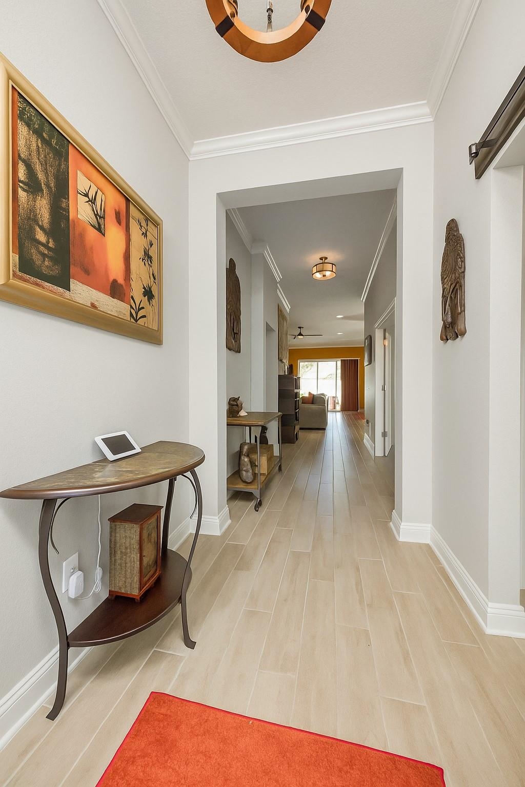 50 Salt Point St. Augustine, FL 32086 - Photo 13 of 76 Hallway featuring ornamental molding and wood finish floors