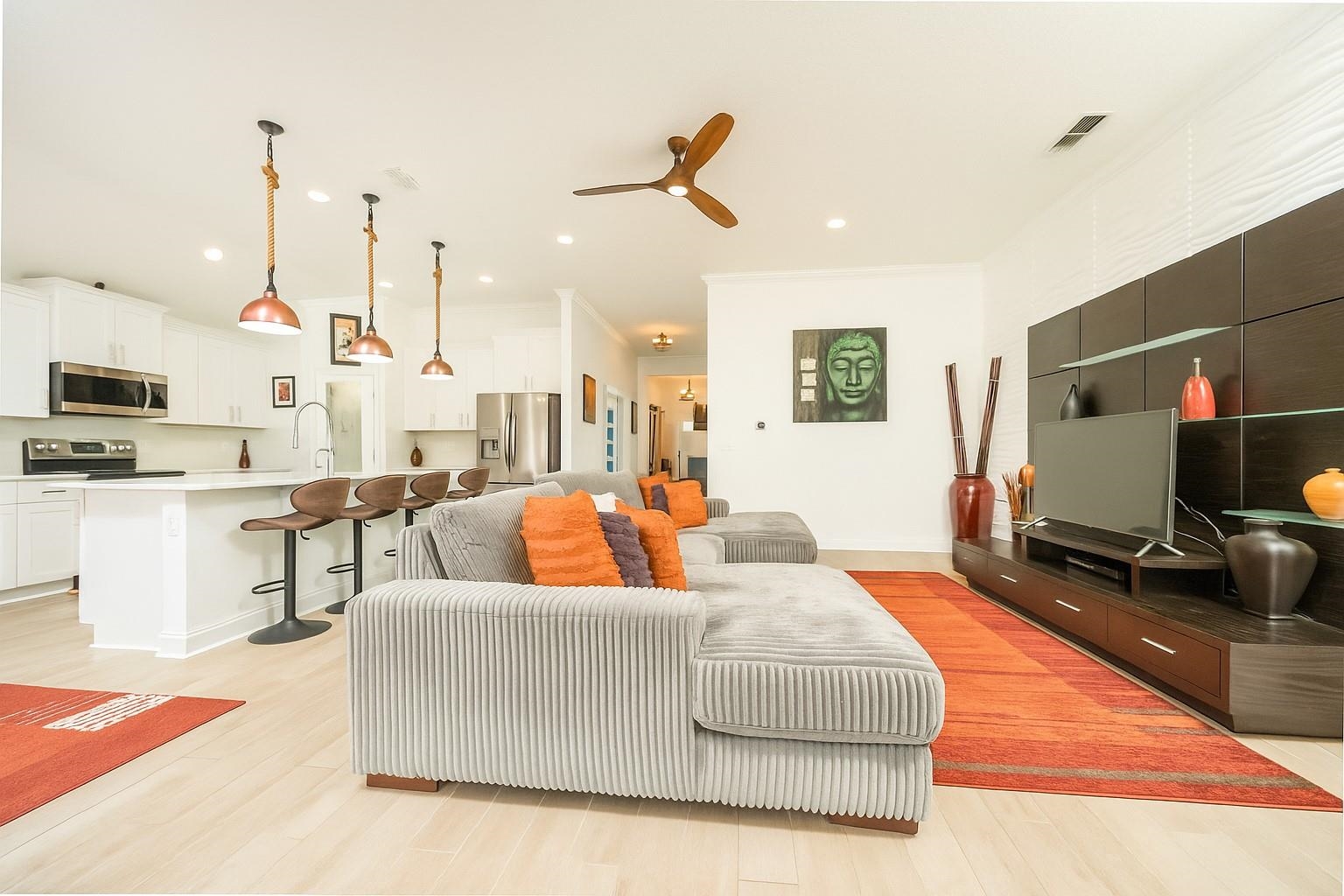 50 Salt Point St. Augustine, FL 32086 - Photo 15 of 76 Living area featuring light wood-style floors, a ceiling fan, recessed lighting, and crown molding