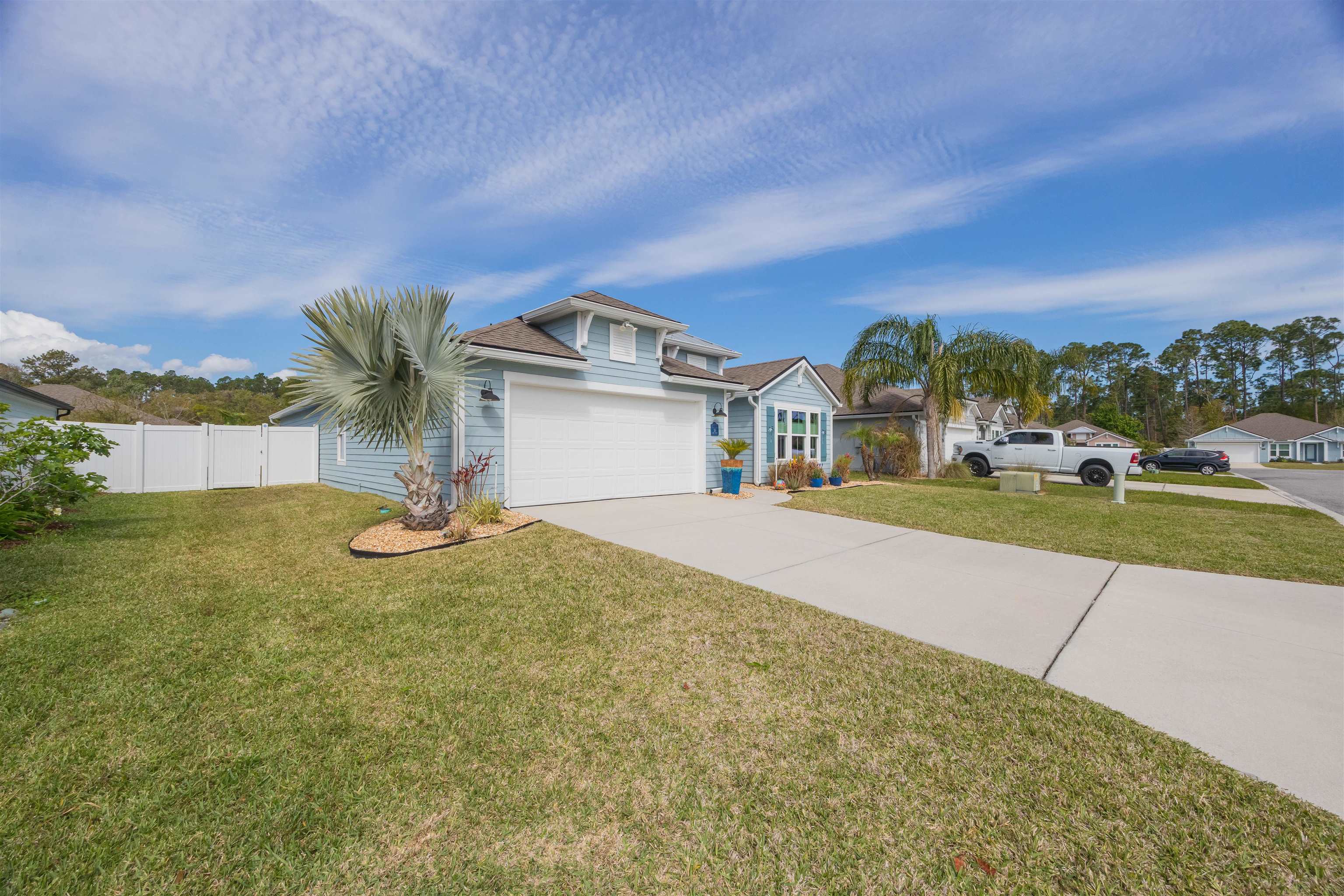 50 Salt Point St. Augustine, FL 32086 - Photo 5 of 76 a front view of a house with a yard