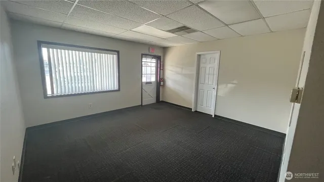an empty room with windows