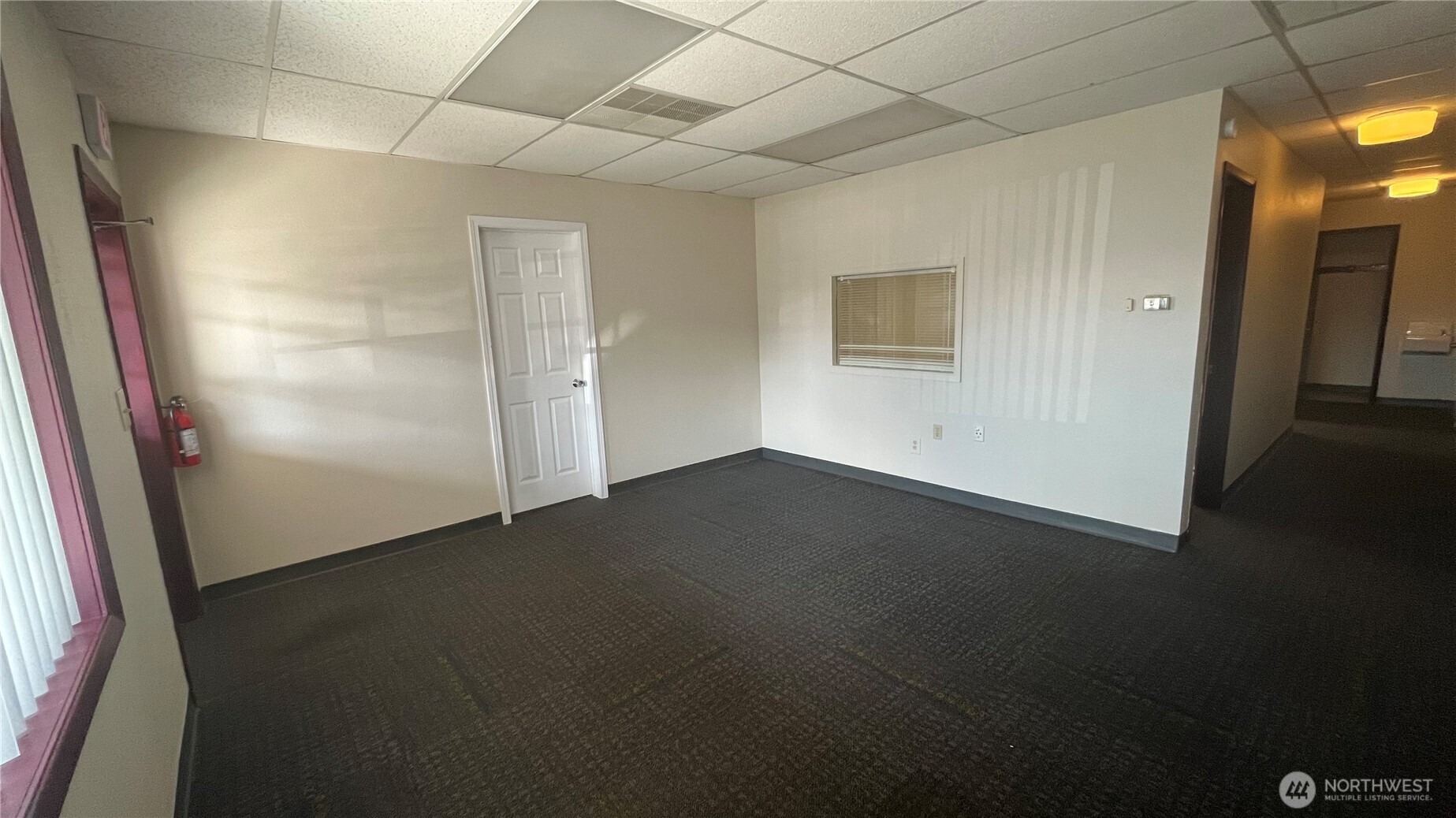 1815 Portland Avenue, Unit 3 Walla Walla, WA 99362 - Photo 5 of 16 an empty room with windows