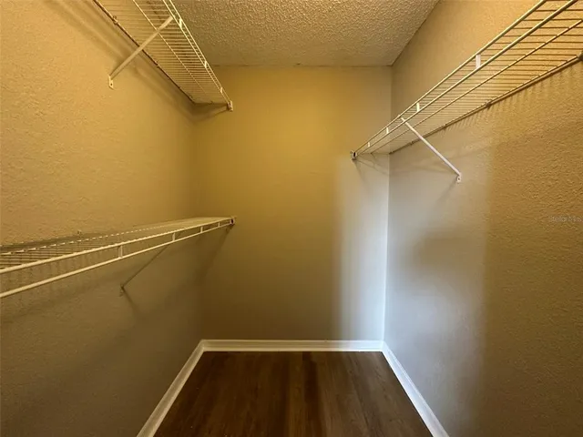 a view of a room with racks on the wall