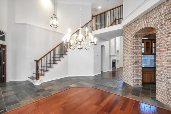 a view of front door with wooden floor