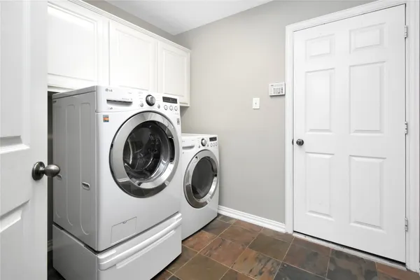a bathroom with a sink toilet and mirror