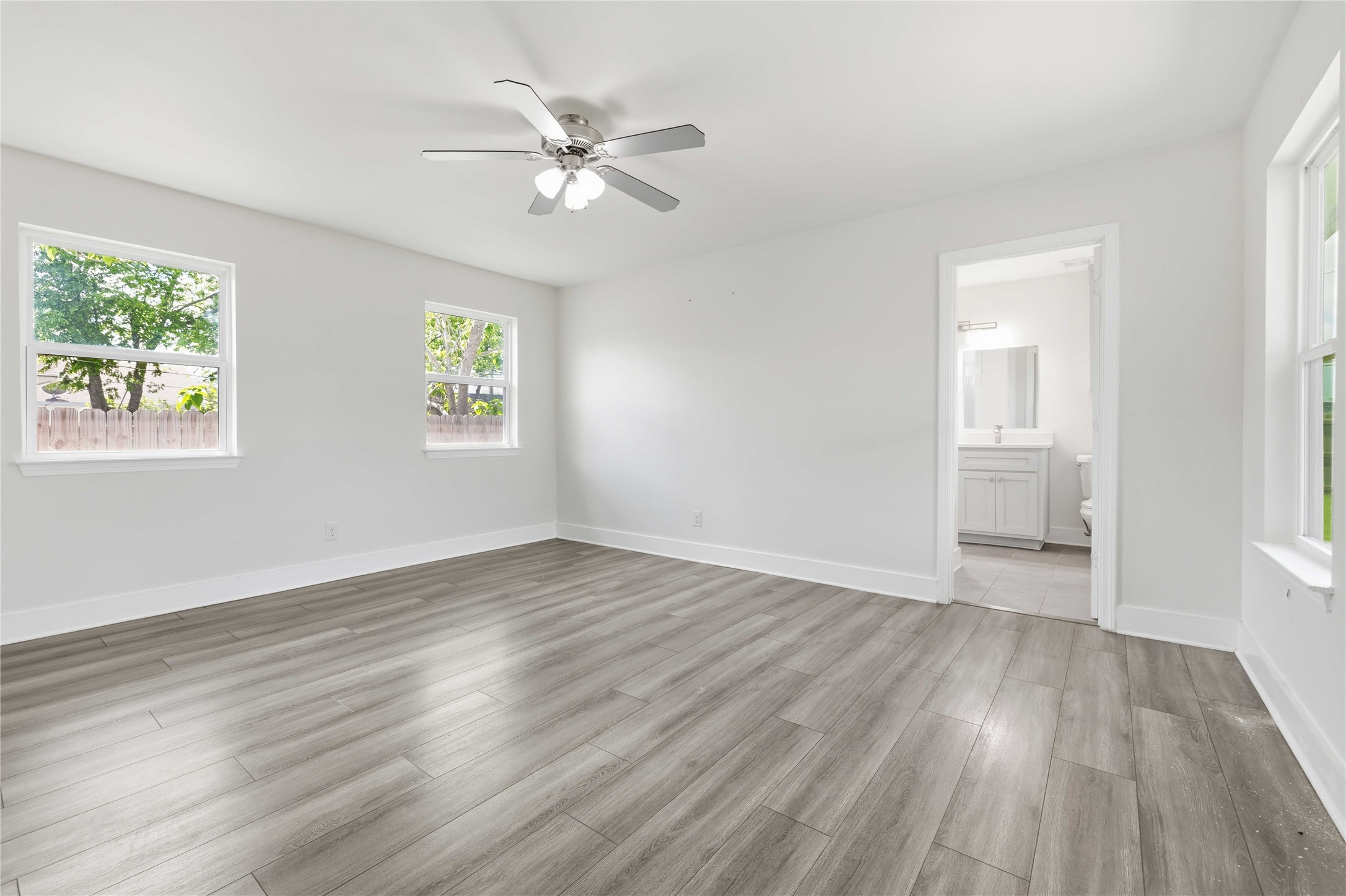 400 Booth Street Taylor, TX 76574 - Photo 17 of 35 Spare room featuring ceiling fan and light wood finished floors