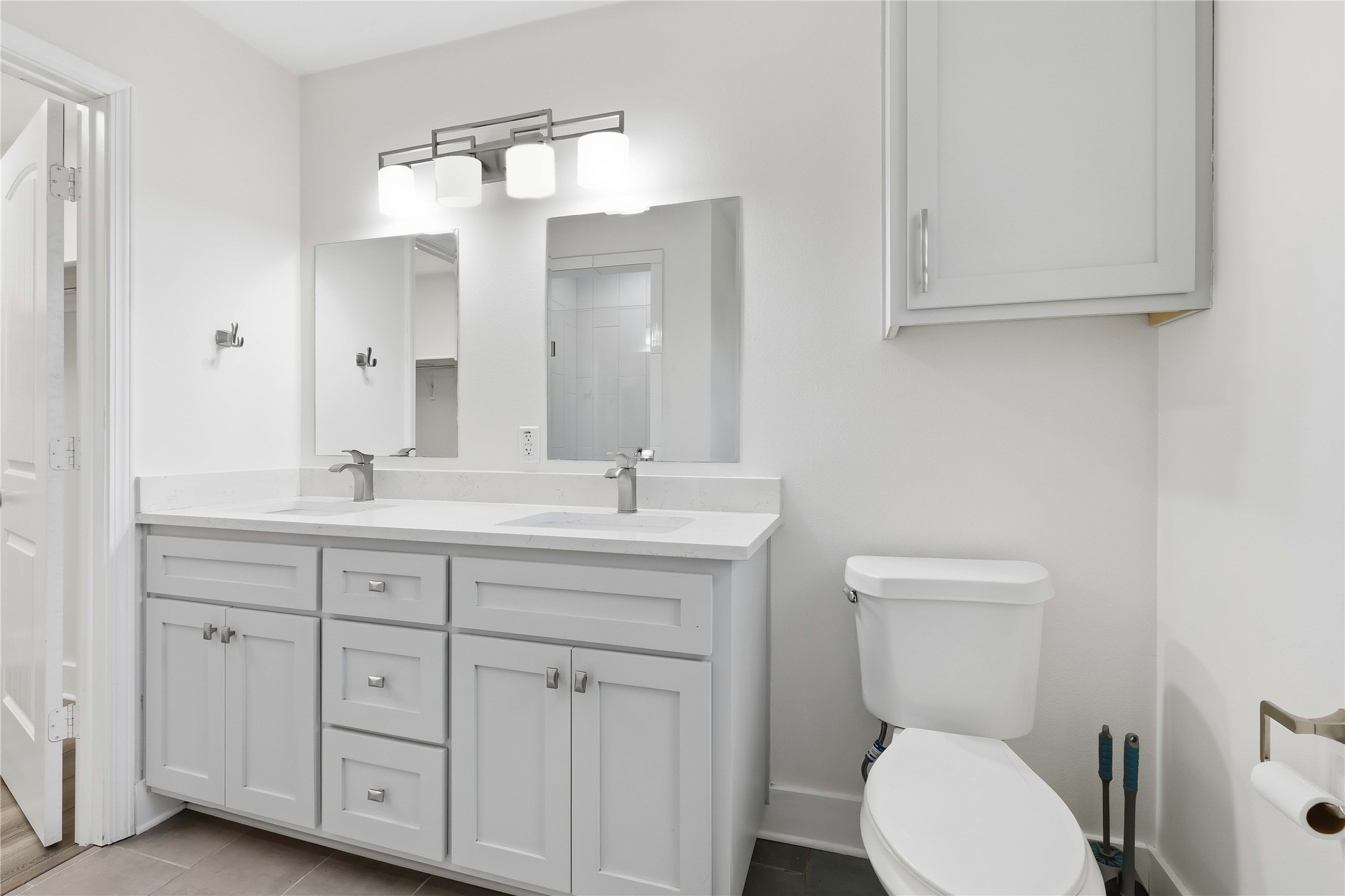 400 Booth Street Taylor, TX 76574 - Photo 20 of 35 Bathroom featuring double vanity and toilet