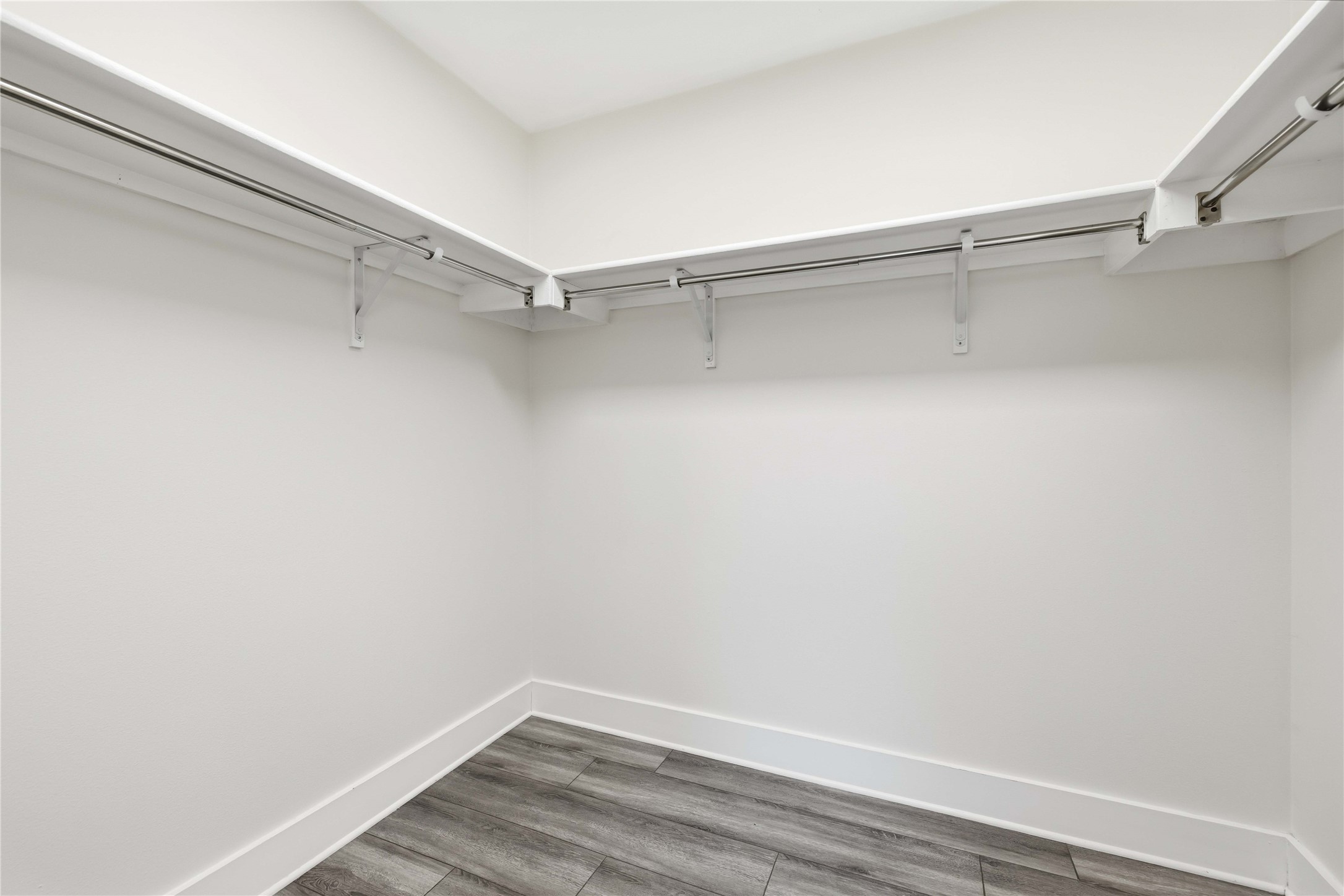 400 Booth Street Taylor, TX 76574 - Photo 22 of 35 Walk in closet with wood finished floors