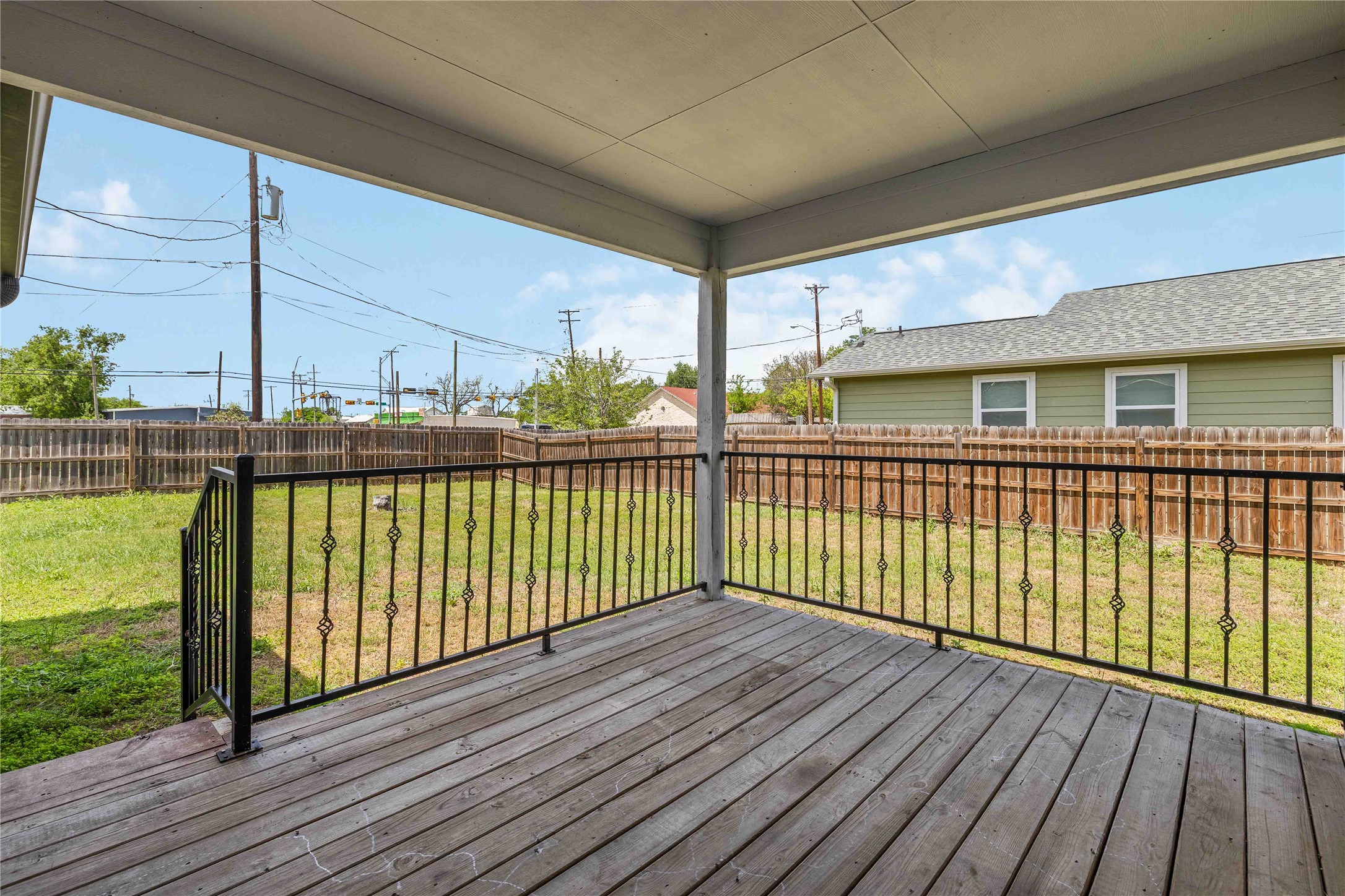 400 Booth Street Taylor, TX 76574 - Photo 30 of 35 Deck with a fenced backyard