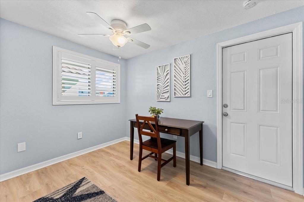 5028 Ensign Loop New Port Richey, FL 34652 - Photo 31 of 76 a workspace with wooden floor