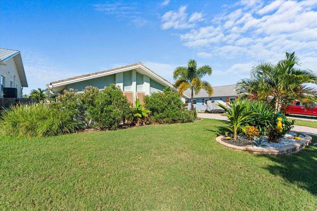 5028 Ensign Loop New Port Richey, FL 34652 - Photo 5 of 76 a front view of a house with a yard