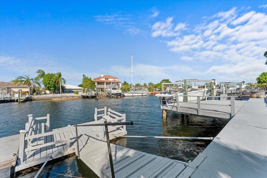 5028 Ensign Loop New Port Richey, FL 34652 - Photo 52 of 76 a view of a lake from a balcony