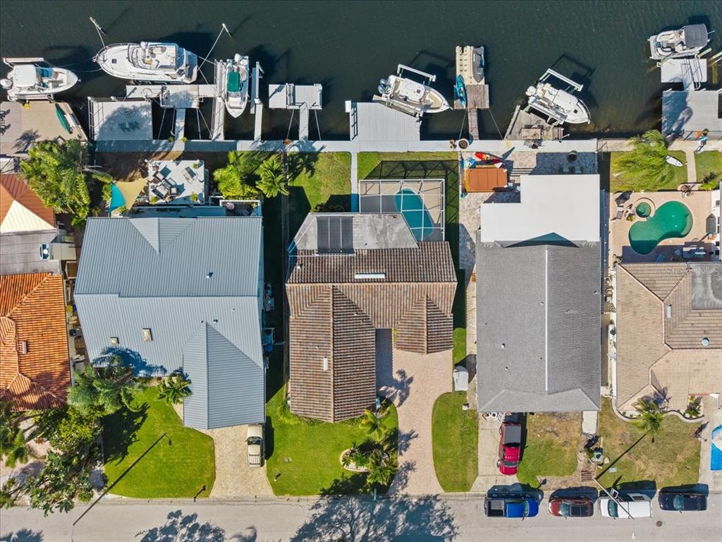 5028 Ensign Loop New Port Richey, FL 34652 - Photo 54 of 76 an aerial view of houses with outdoor space