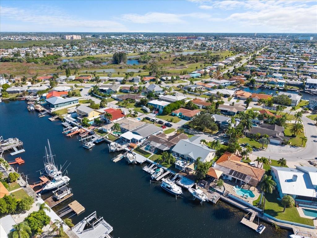5028 Ensign Loop New Port Richey, FL 34652 - Photo 62 of 76 an aerial view of residential houses with outdoor space