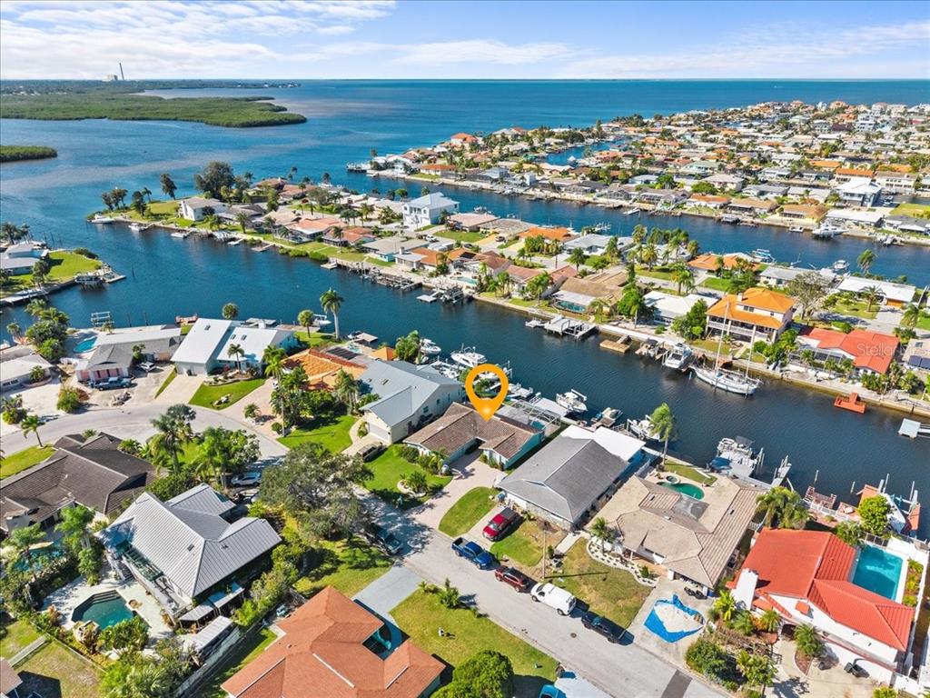 5028 Ensign Loop New Port Richey, FL 34652 - Photo 69 of 76 an aerial view of a city with lots of residential buildings ocean and ocean view