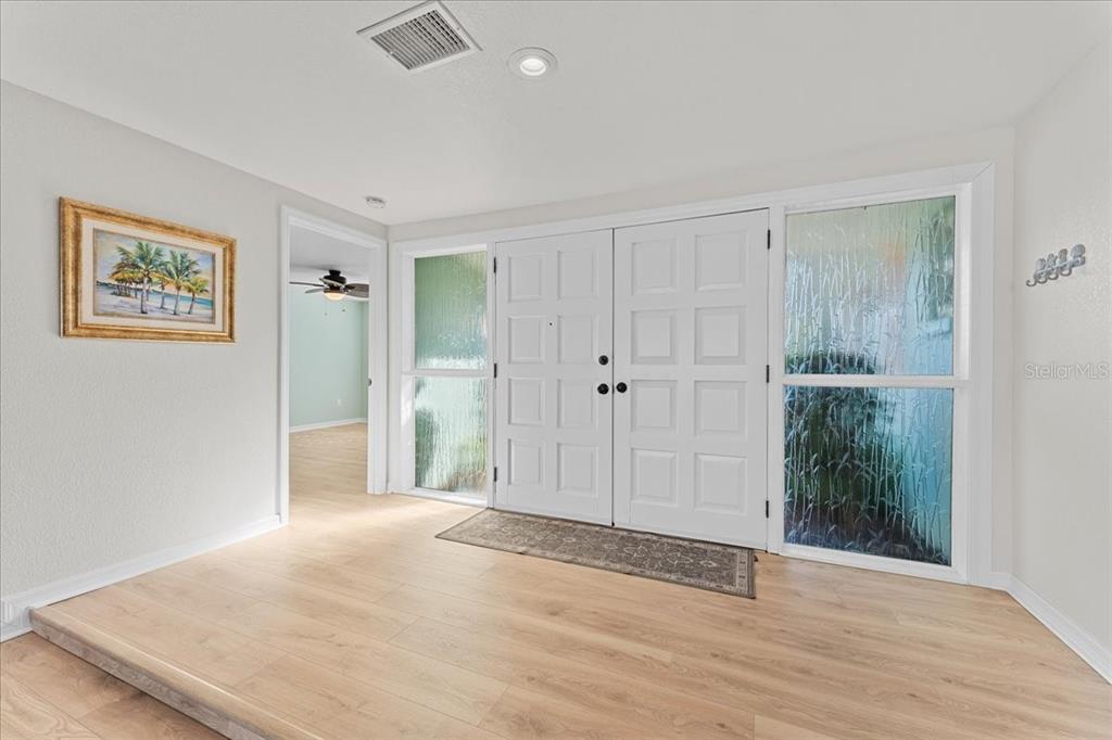 5028 Ensign Loop New Port Richey, FL 34652 - Photo 7 of 76 a view of an empty room